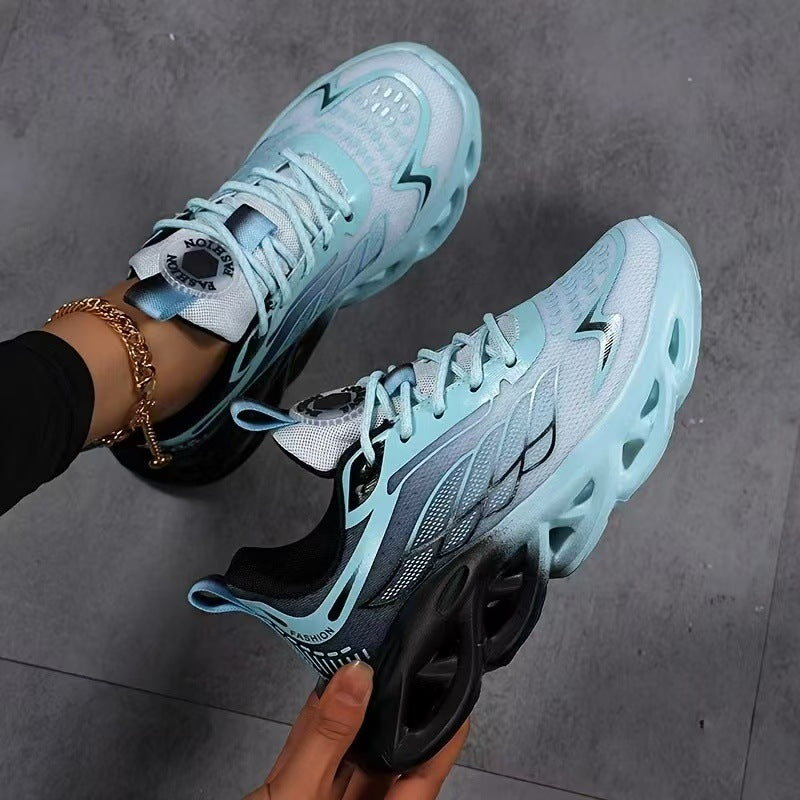 Pair of light blue breathable running shoes with lace-up closure