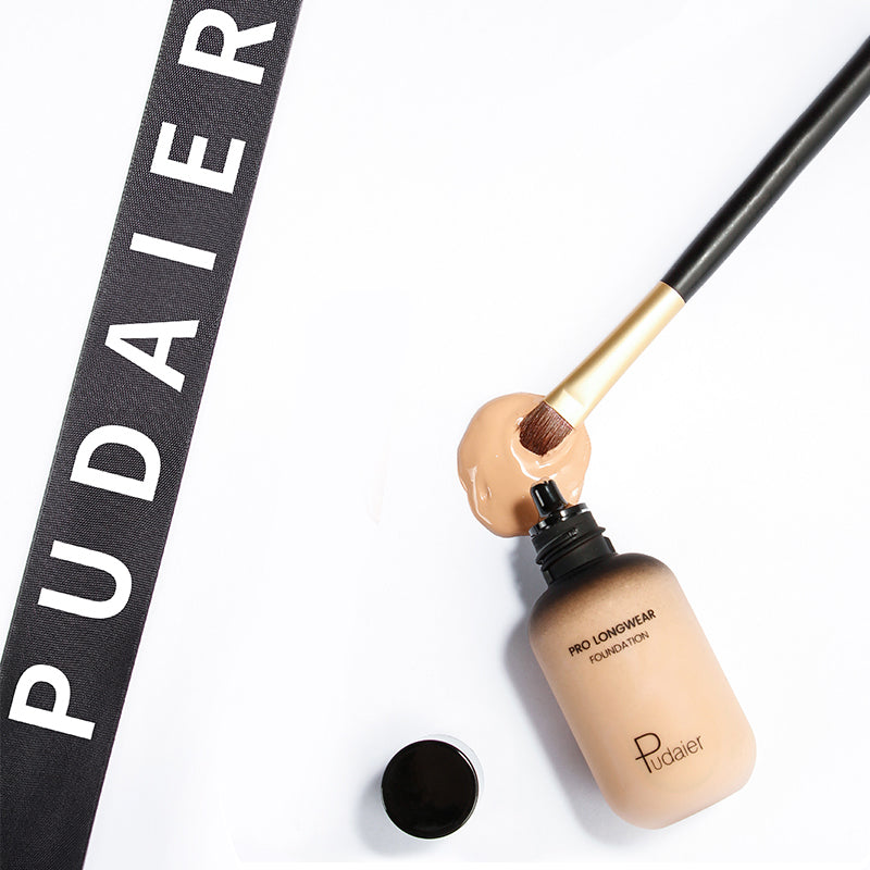 Foundation bottle with swatch colors showing coverage and waterproof features.