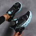 Pair of light blue breathable running shoes with lace-up closure
