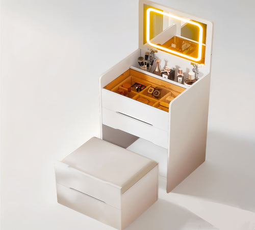 White compact vanity desk with a flip top mirror and drawers for makeup storage